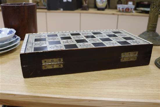 An Indian mother of pearl and bone chess/backgammon games box with horn and bone counters width 42cm depth 21cm